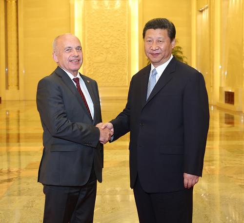 7月18日,国家主席习近平在北京人民大会堂会见瑞士联邦主席毛雷尔。新华社记者 刘卫兵 摄
