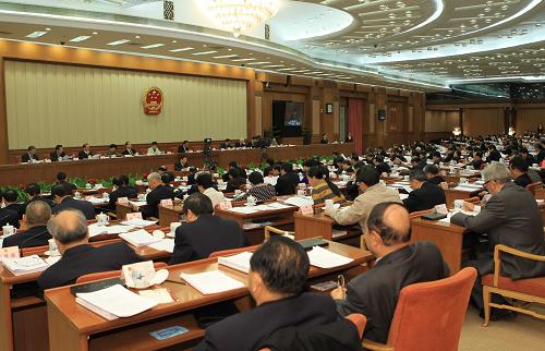 12月22日,十一届全国人大常委会第十八次会议在北京人民大会堂举行第二次全体会议。吴邦国委员长出席会议。新华社记者 樊如钧 摄
