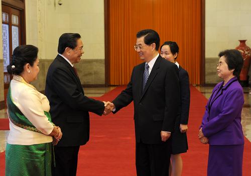 9月19日,中共中央总书记、国家主席胡锦涛在北京人民大会堂主持仪式,欢迎老挝人民革命党中央总书记、国家主席朱马利访华。新华社记者 饶爱民 摄