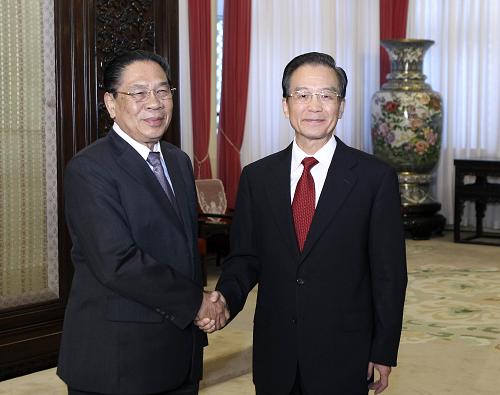 9月20日,中共中央政治局常委、国务院总理温家宝在北京中南海紫光阁会见老挝人民革命党中央总书记、国家主席朱马利。新华社记者 丁林 摄