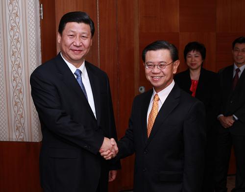 11月14日,中国国家副主席习近平在新加坡会见新加坡副总理黄根成。新华社记者 庞兴雷 摄