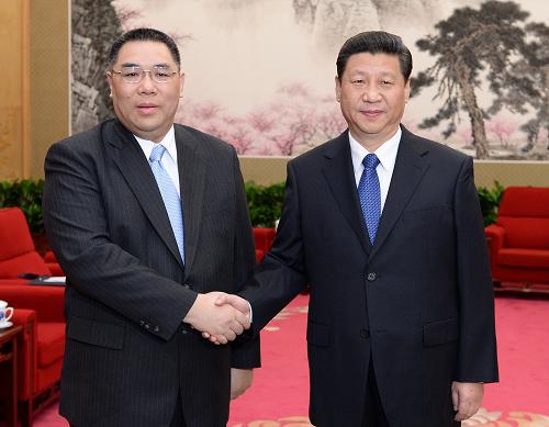 3月18日,中国国家主席习近平在北京中南海会见来京列席第十二届全国人民代表大会第一次会议闭幕式的澳门特别行政区行政长官崔世安。新华社记者 刘建生 摄