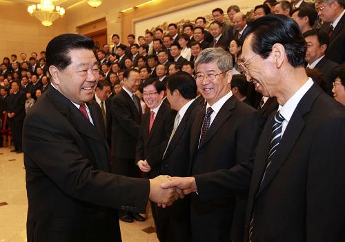 9月27日,中国统一战线理论研究会第五届会员代表大会在北京召开。会前,中共中央政治局常委、全国政协主席贾庆林会见全体代表并讲话。 新华社记者 庞兴雷 摄