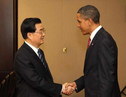 6月26日,中国国家主席胡锦涛在加拿大多伦多会见美国总统奥巴马。新华社记者 马占成 摄
