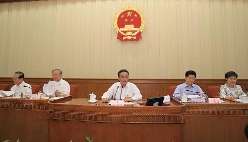 6月27日,十一届全国人大常委会第二十一次会议在北京人民大会堂举行第一次全体会议。吴邦国委员长主持会议。新华社记者 樊如钧 摄