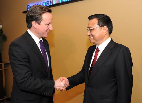 1月28日,中国国务院副总理李克强在瑞士达沃斯会见英国保守党领导人大卫·卡梅伦。 新华社记者谢环驰摄
