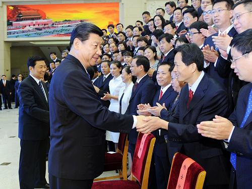 8月29日,中共中央政治局常委、中央书记处书记、国家副主席习近平在北京会见全国组织系统讲党性重品行作表率活动总结会议代表并讲话。新华社记者 李涛 摄
