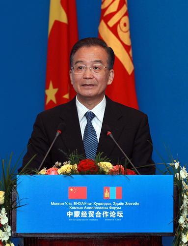 温家宝出席中蒙经贸合作论坛开幕式并致辞 6月2日,中国国务院总理温家宝在乌兰巴托出席中蒙经贸合作论坛开幕式并致辞。 新华社记者 庞兴雷 摄