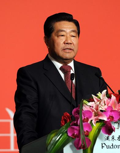 12月21日,第四届两岸经贸文化论坛在上海闭幕。中共中央政治局常委、全国政协主席贾庆林和中国国民党主席吴伯雄出席闭幕式。这是贾庆林在闭幕式上致词。新华社记者 李学仁 摄