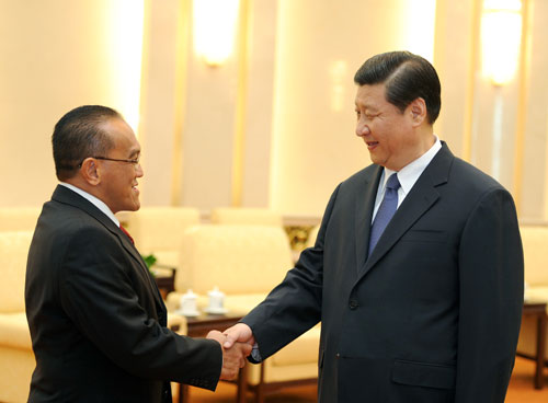 4月20日,中共中央政治局常委、国家副主席习近平在北京人民大会堂会见以总主席阿布里扎尔·巴克里为团长的印尼专业集团党代表团。新华社记者 刘建生 摄