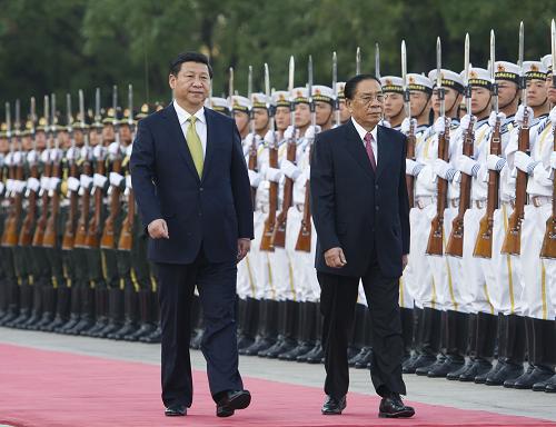 9月26日,中共中央总书记、国家主席习近平在北京人民大会堂同老挝人民革命党中央总书记、国家主席朱马里举行会谈。会谈前,习近平在人民大会堂东门外广场为朱马里举行欢迎仪式。新华社记者 谢环驰 摄