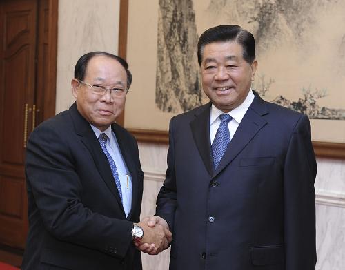 1月16日,中国全国政协主席贾庆林在北京钓鱼台国宾馆会见泰国上议院议长尼空·瓦拉帕尼。新华社记者 谢环驰 摄