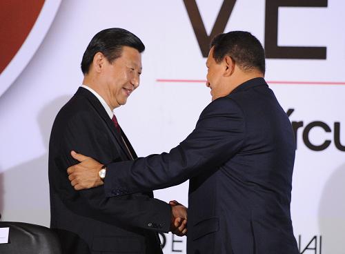 2月17日,国家副主席习近平和委内瑞拉总统查韦斯在加拉加斯共同出席中国和委内瑞拉企业家研讨会开幕式。 新华社记者 黄敬文 摄