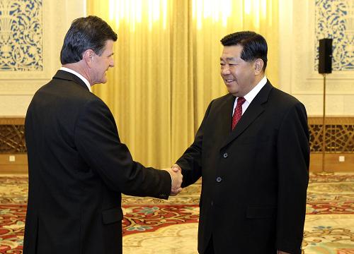 9月20日,中国全国政协主席贾庆林在北京人民大会堂会见斯洛文尼亚国民委员会主席卡夫契奇。新华社记者 丁林 摄