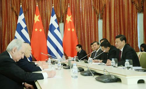 2月7日,国家主席习近平在俄罗斯索契会见希腊总统帕普利亚斯。新华社记者 兰红光 摄