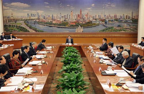 10月14日,全国人大常委会委员长吴邦国在北京人民大会堂主持召开十一届全国人大常委会第五十一次委员长会议。 新华社记者李涛摄