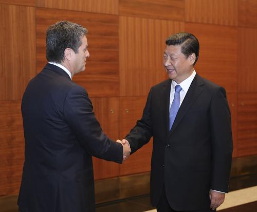 9月5日,国家主席习近平在圣彼得堡会见世界贸易组织总干事阿泽维多。新华社记者 丁林 摄
