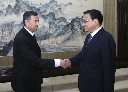 7月27日,国务院副总理李克强在北京中南海紫光阁会见来华出席中土合作委员会第二次会议的土库曼斯坦副总理霍贾穆罕默多夫。 新华社记者 庞兴雷摄