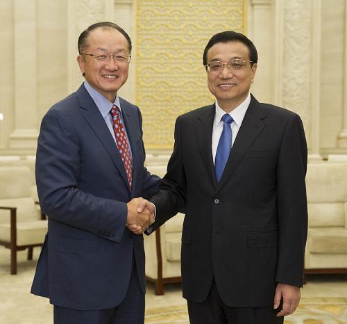 9月16日,中国国务院总理李克强在北京人民大会堂会见世界银行行长金墉。新华社记者 黄敬文 摄