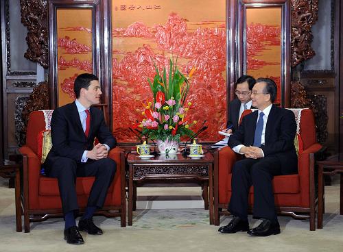 3月16日,国务院总理温家宝在北京中南海紫光阁会见英国外交大臣米利班德。新华社记者 李涛 摄