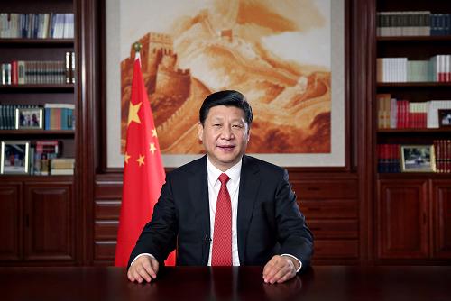 新年前夕,国家主席习近平通过中国国际广播电台、中央人民广播电台、中央电视台发表二〇一四年新年贺词。新华社记者 兰红光 摄