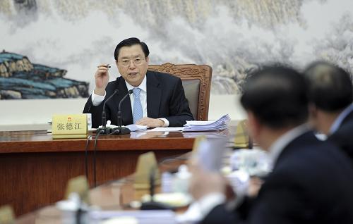12月16日,全国人大常委会委员长张德江在北京人民大会堂主持召开十二届全国人大常委会第十四次委员长会议。新华社记者 张铎 摄