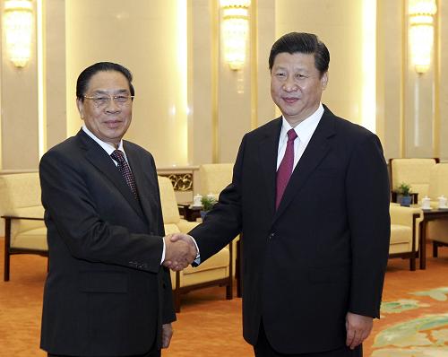 9月20日,中共中央政治局常委、国家副主席习近平在北京人民大会堂会见来华进行正式友好访问的老挝人民革命党中央总书记、国家主席朱马利。新华社记者 丁林 摄