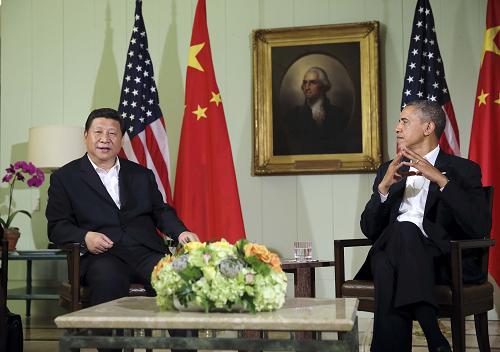 6月7日,中国国家主席习近平在美国加利福尼亚州安纳伯格庄园与美国总统奥巴马举行中美元首第一次会晤。这是会晤后,习近平与奥巴马共同会见记者。新华社记者 兰红光 摄