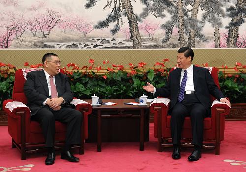 12月20日,中共中央总书记习近平在北京中南海会见来京述职的澳门特别行政区行政长官崔世安。新华社记者 饶爱民 摄