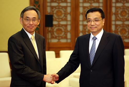 7月16日,国务院副总理李克强在北京人民大会堂会见美国能源部长朱棣文。新华社记者 姚大伟 摄