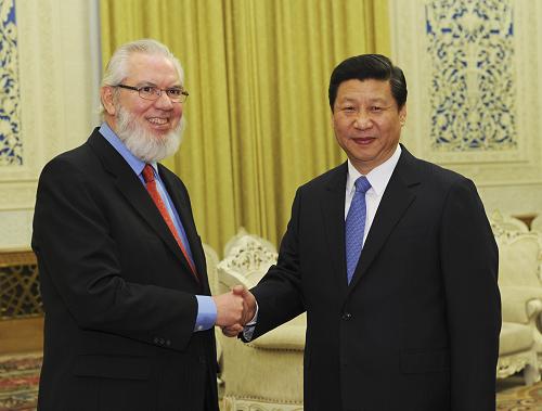11月29日,国家副主席习近平在北京人民大会堂会见来访的国际劳工组织总干事胡安·索马维亚一行。新华社记者 饶爱民 摄