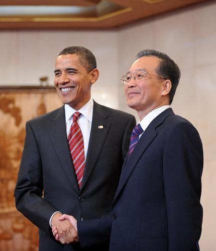11月18日,中国国务院总理温家宝在北京钓鱼台国宾馆会见正在中国进行国事访问的美国总统奥巴马。新华社记者 刘建生 摄
