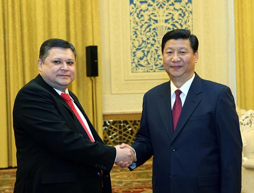 3月30日,国家副主席习近平在北京人民大会堂会见来访的哈萨克斯坦外长塔任。 新华社记者兰红光摄