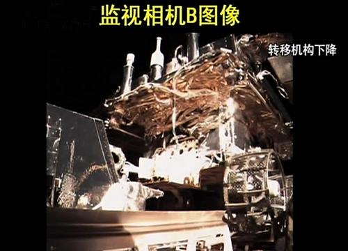 这是“嫦娥三号”着陆器巡视器正在进行分离的画面。 新华社发