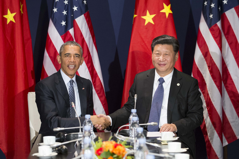 11月30日，国家主席习近平在巴黎会见美国总统奥巴马。