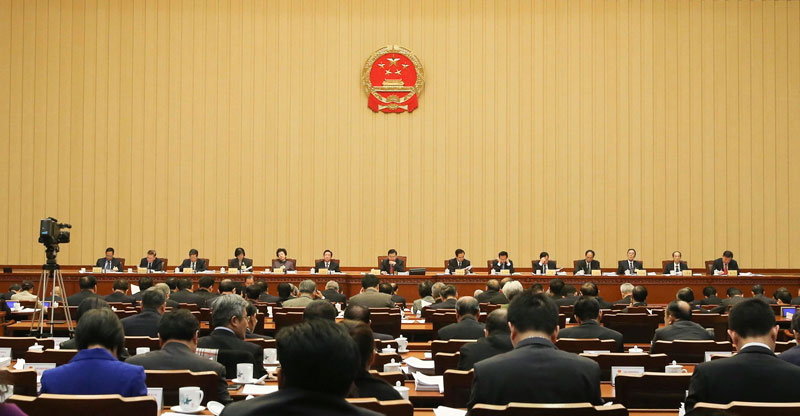12月21日，十二届全国人大常委会第十八次会议在北京人民大会堂开幕。张德江委员长主持会议。新华社记者 丁林 摄
