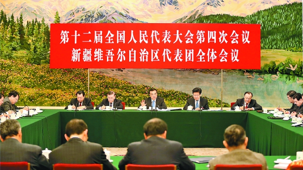 3月10日，十二届全国人大四次会议新疆代表团审议会场。