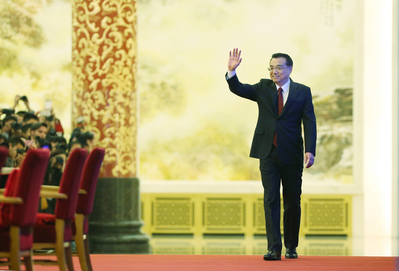 3月16日，国务院总理李克强在北京人民大会堂与中外记者见面，并回答记者提问。新华社记者 刘卫兵 摄