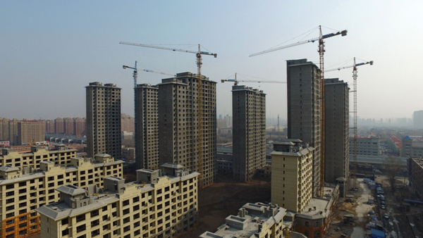 这是吉林省长春市亚泰大街附近一处在建住宅（3月18日摄）。新华社记者 张楠 摄
