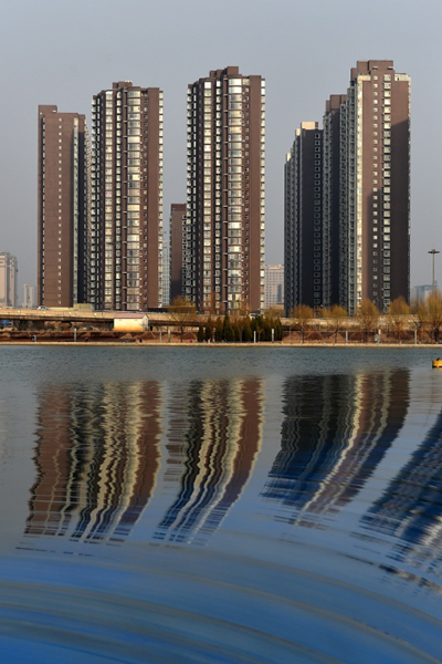 这是山西省太原市汾河东岸的商品房（3月17日摄）。3月18日，国家统计局公布2月份我国70个大中城市住宅销售价格变动情况。数据显示，全国70个大中城市新建商品住宅（不含保障性住房）价格环比下降的城市有15个，上涨的城市有47个，持平的城市有8个。新华社记者 詹彦 摄