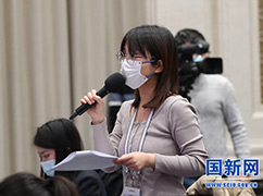 12封面新闻记者提问_large.jpg