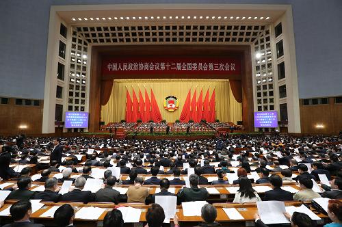 3月13日,全国政协十二届三次会议在北京人民大会堂举行闭幕会。 新华社记者 刘卫兵 摄