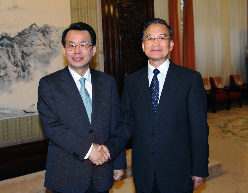 9月7日,中国国务院总理温家宝在中南海紫光阁会见韩国总理韩升洙。温家宝对韩升洙前来出席北京残奥会开幕式表示欢迎。新华社记者 李涛 摄